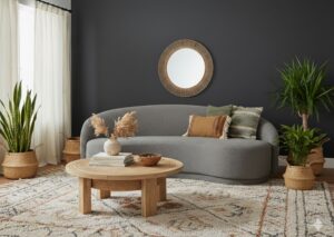 Grey upholstered sofa that helps match paint furniture with modern wall colors