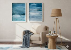 Ocean watercolor art above a wooden console in a coastal boho space.